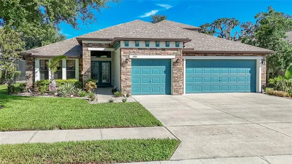 $588,400 | 4907 Pointe O Woods Drive, Wesley Chapel, FL 33543