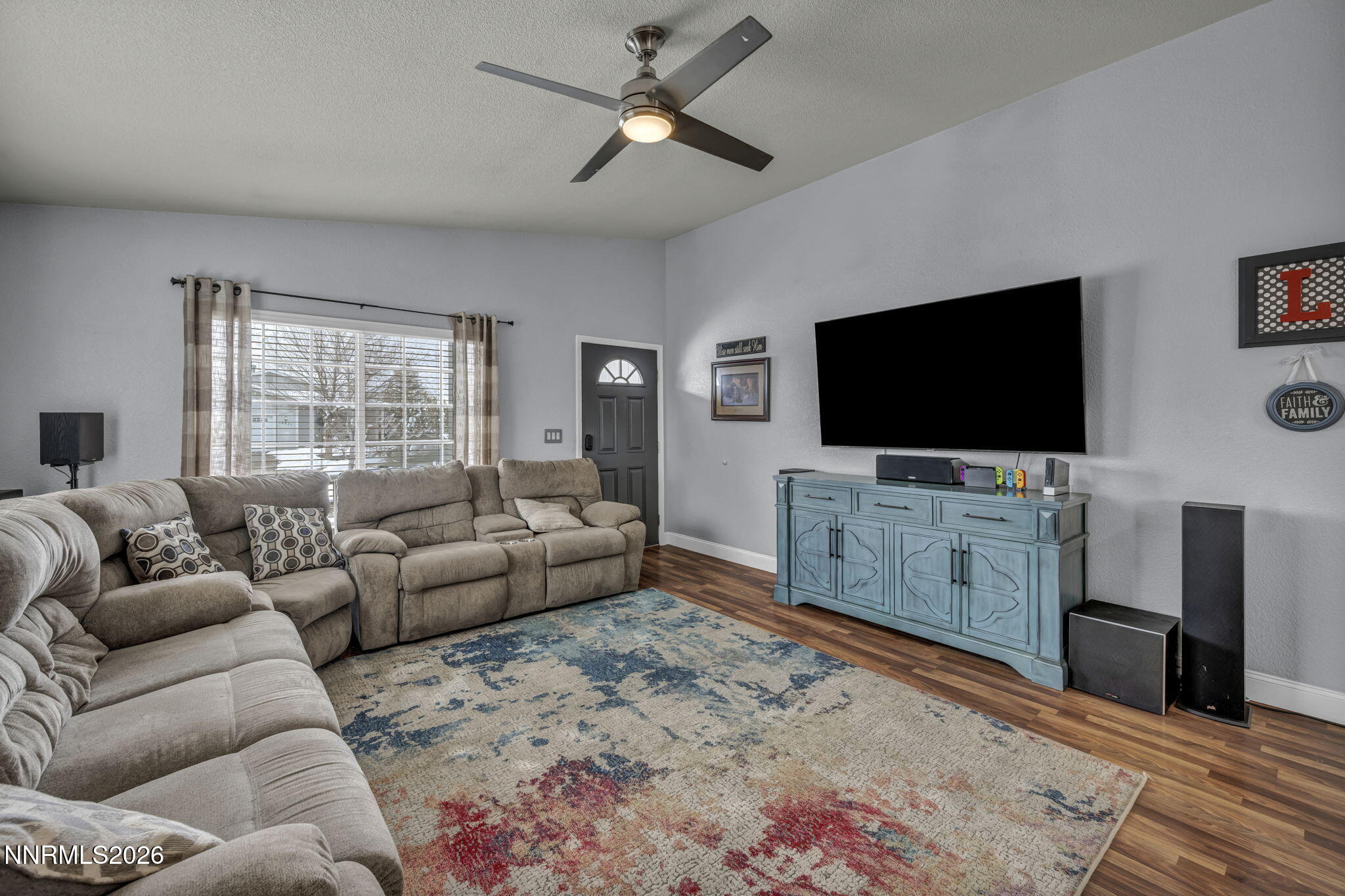 18270 Cedar View Court Reno, NV 89508 - Photo 11 of 48 a living room with furniture and a flat screen tv