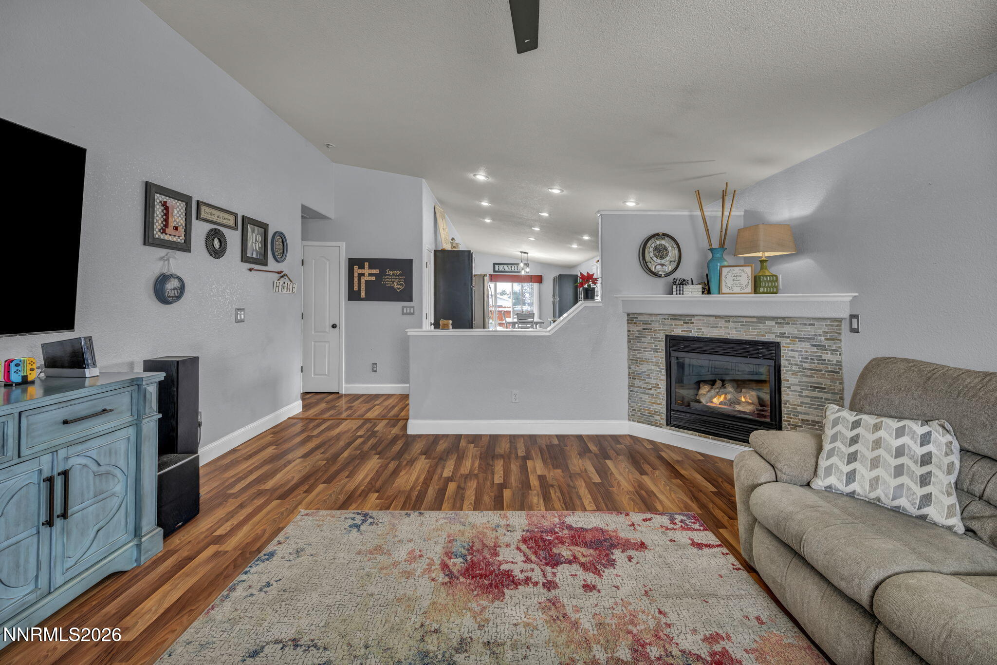 18270 Cedar View Court Reno, NV 89508 - Photo 13 of 48 a living room with furniture and a fireplace