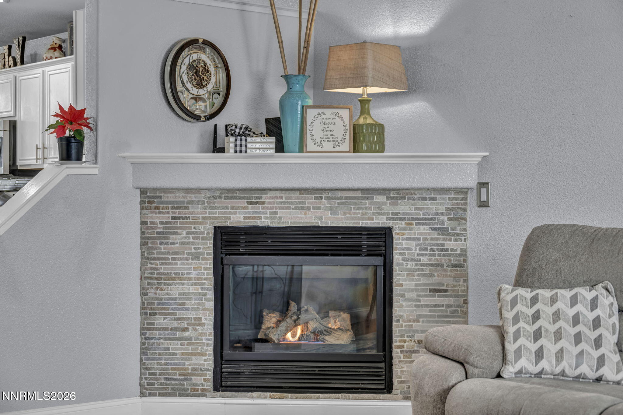 18270 Cedar View Court Reno, NV 89508 - Photo 14 of 48 a living room with furniture and a fireplace