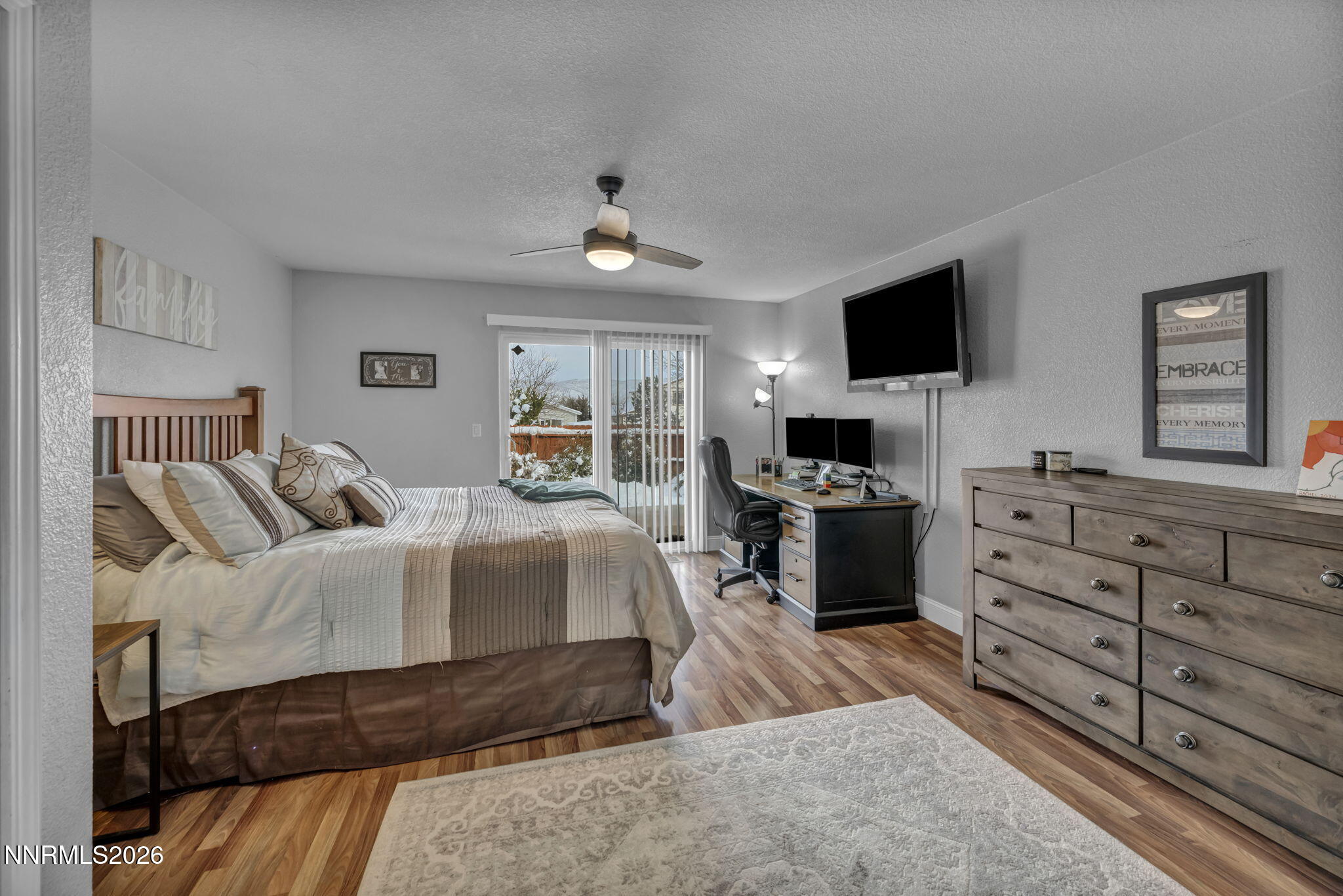 18270 Cedar View Court Reno, NV 89508 - Photo 17 of 48 a living room with furniture and a flat screen tv