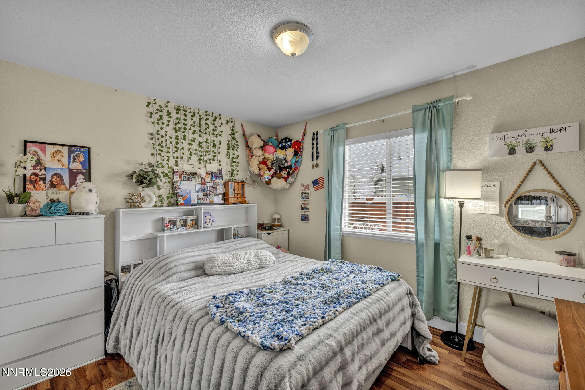 18270 Cedar View Court Reno, NV 89508 - Photo 26 of 48 a bedroom with a bed and a window