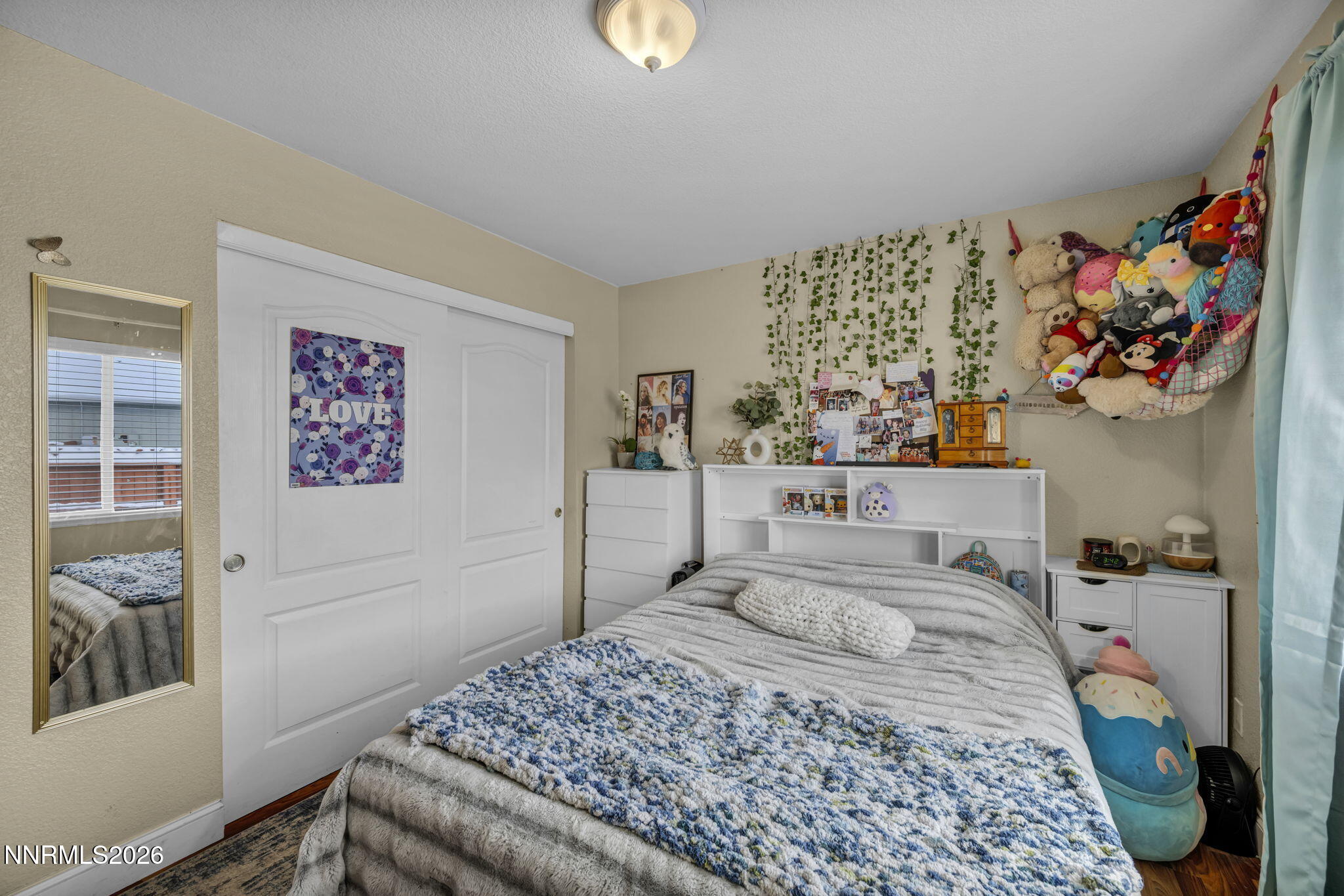 18270 Cedar View Court Reno, NV 89508 - Photo 27 of 48 a bedroom with a bed and a window