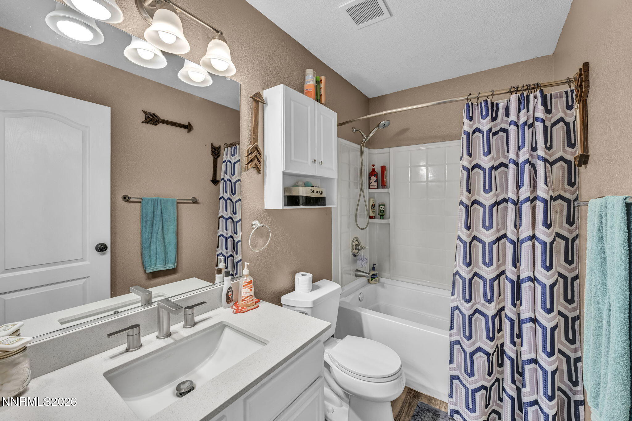 18270 Cedar View Court Reno, NV 89508 - Photo 33 of 48 a bathroom with a sink a toilet and shower