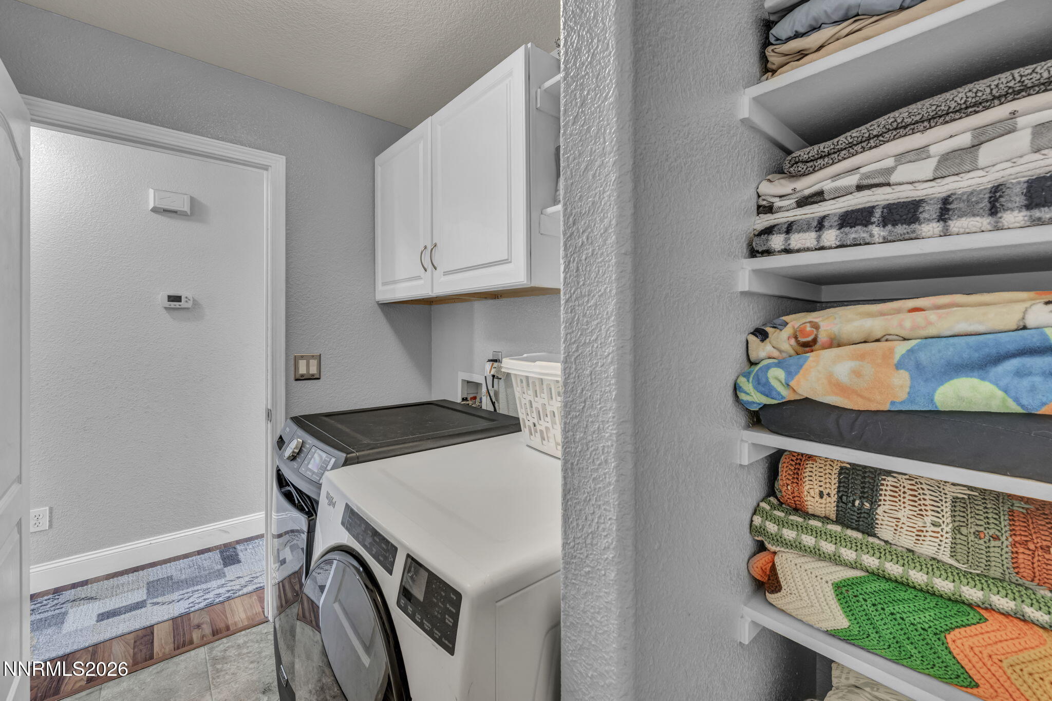 18270 Cedar View Court Reno, NV 89508 - Photo 34 of 48 a utility room with dryer and washer