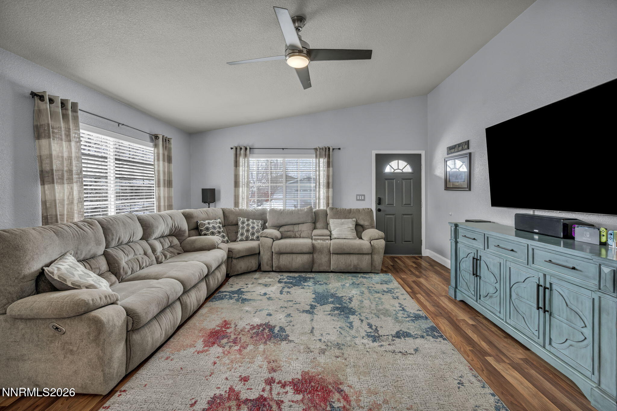 18270 Cedar View Court Reno, NV 89508 - Photo 10 of 48 a living room with furniture and a flat screen tv