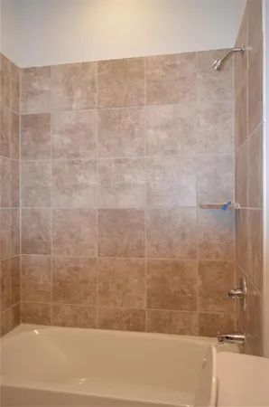 a bathroom with a bathtub