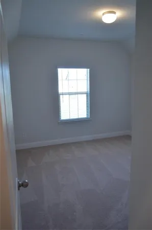 a view of a window in an empty room