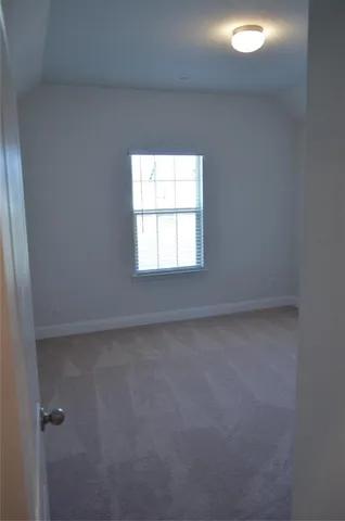 a view of a window in an empty room