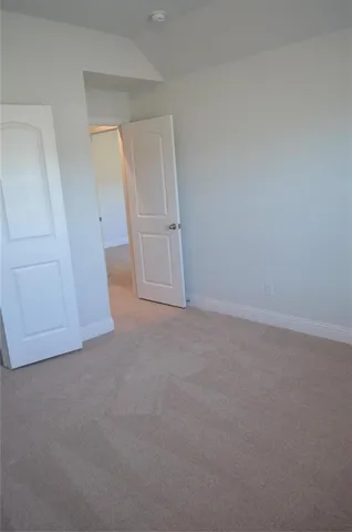 an empty room with closet
