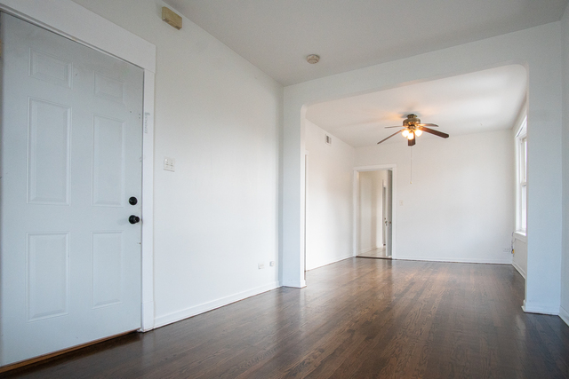 2519 North Pulaski Road Chicago, IL 60639 - Photo 18 of 36 a view of a room with wooden floor