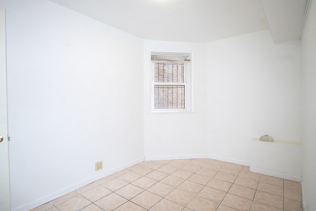2519 North Pulaski Road Chicago, IL 60639 - Photo 26 of 36 a view of an empty room with window