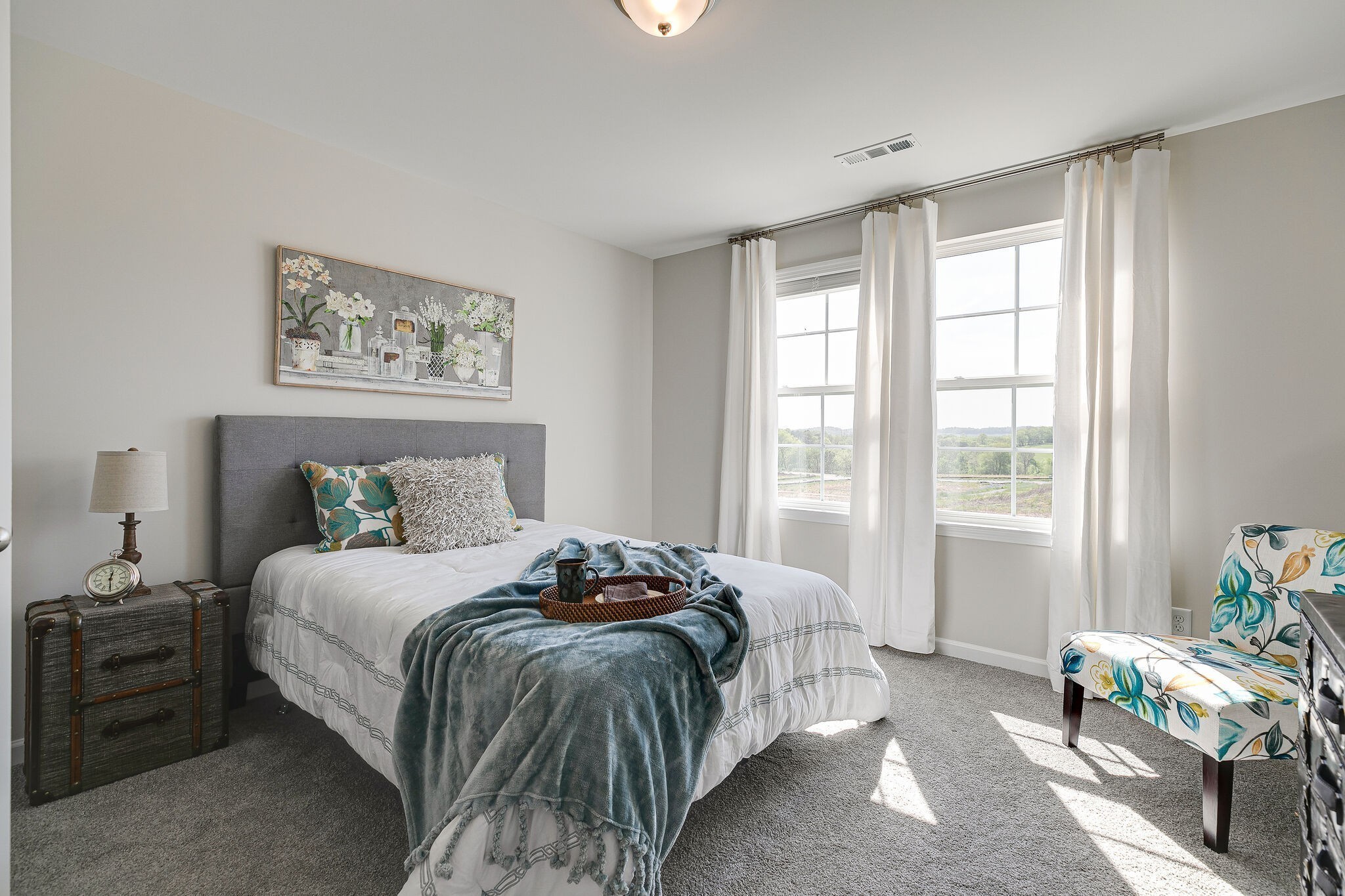 1054 June Wilde Ridge Spring Hill, TN 37174 - Photo 24 of 28 a bedroom with a bed painting on wall and a large window