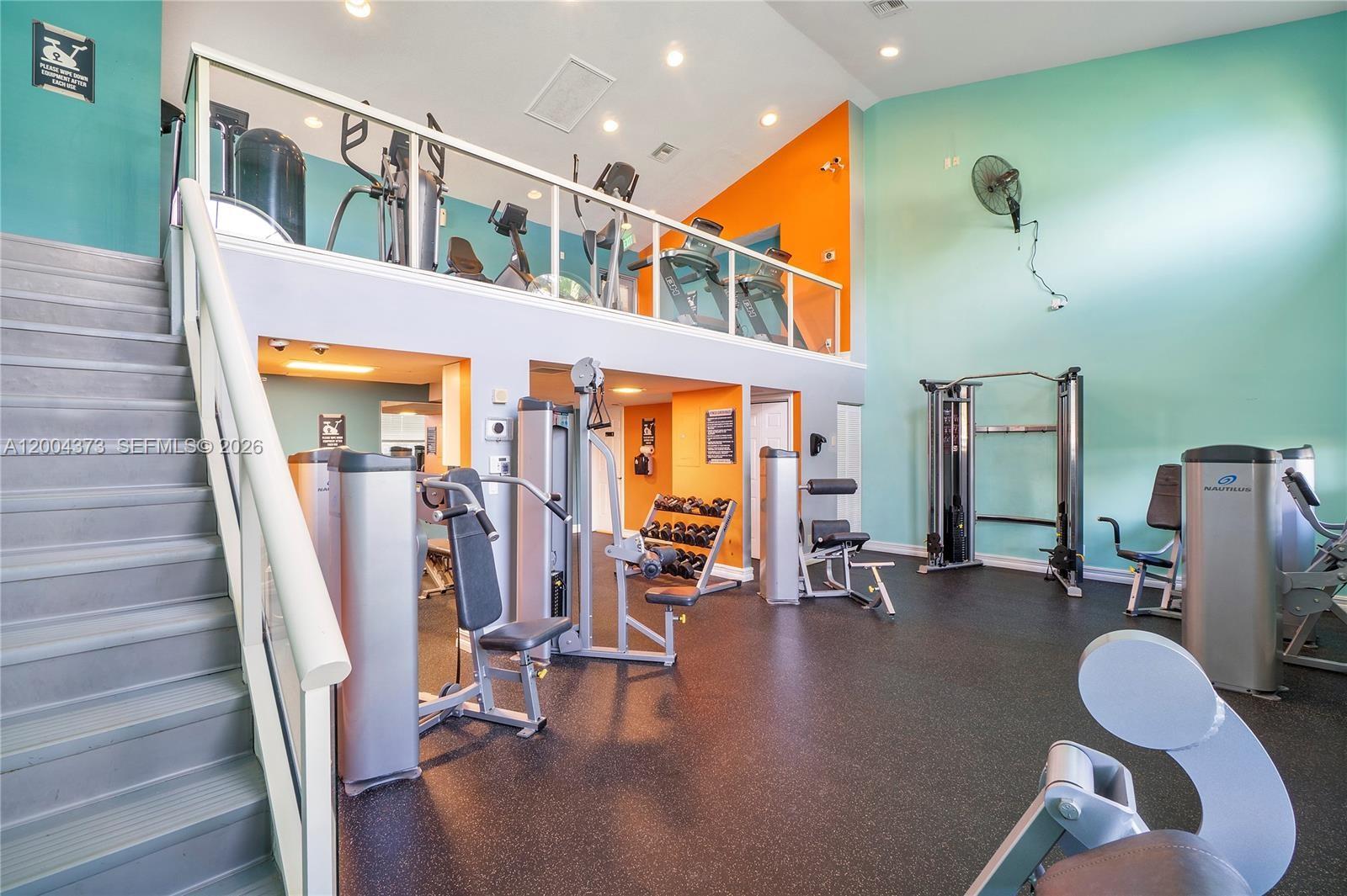 8761 Wiles Road, Unit 306 Coral Springs, FL 33067 - Photo 11 of 19 a view of a room with gym equipment