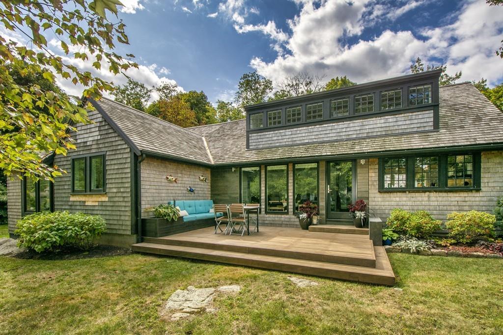 6 Turner Road Scituate, MA 02066 - Photo 1 of 28 a view of a house with swimming pool and sitting area