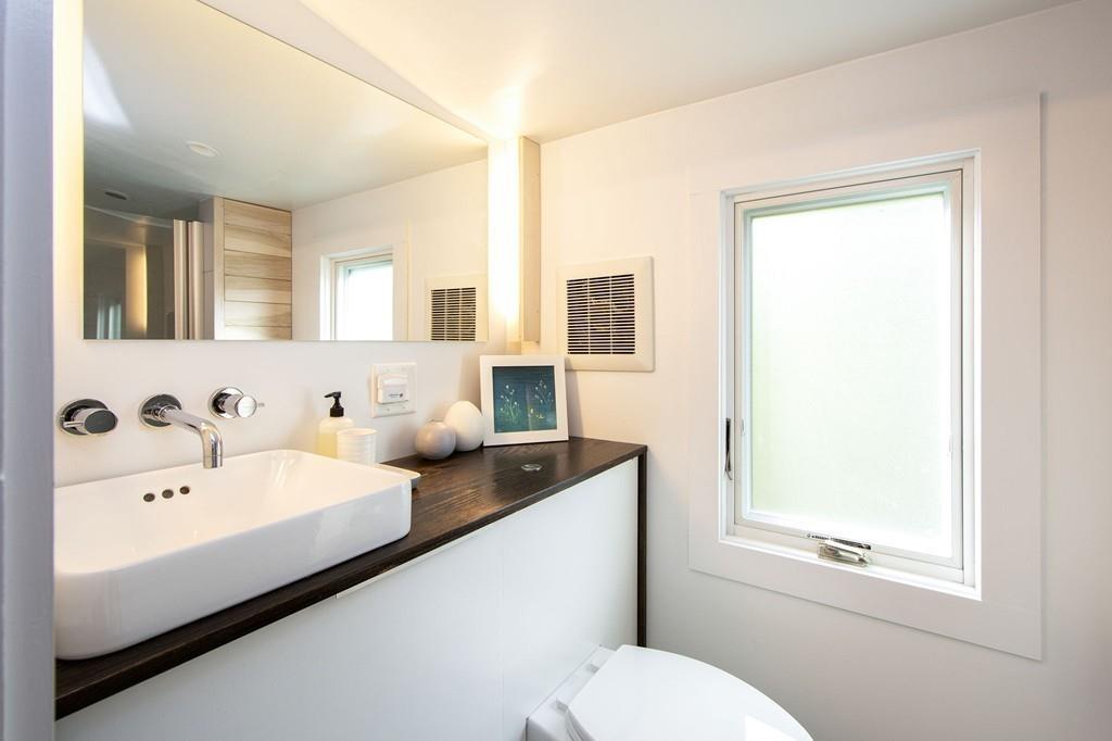 6 Turner Road Scituate, MA 02066 - Photo 17 of 28 a bathroom with a tub sink and mirror