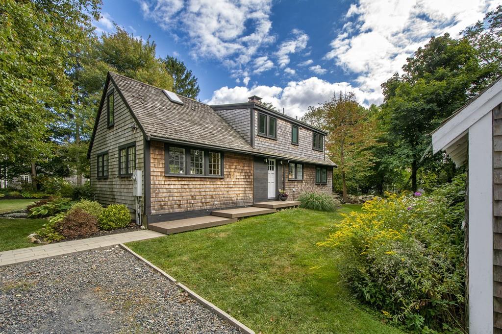 6 Turner Road Scituate, MA 02066 - Photo 2 of 28 a view of a house with a yard plants and large tree