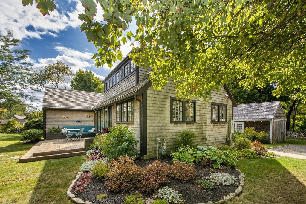 6 Turner Road Scituate, MA 02066 - Photo 3 of 28 front view of a house with a garden