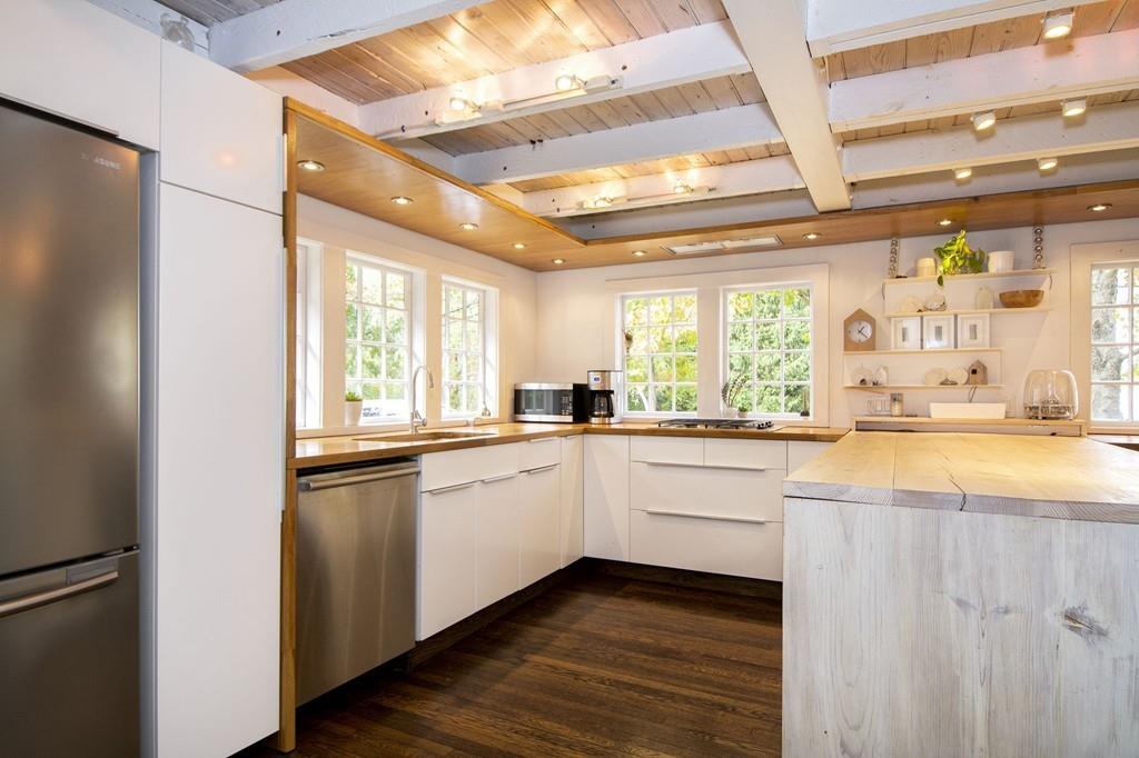 6 Turner Road Scituate, MA 02066 - Photo 8 of 28 a large white kitchen with a large window