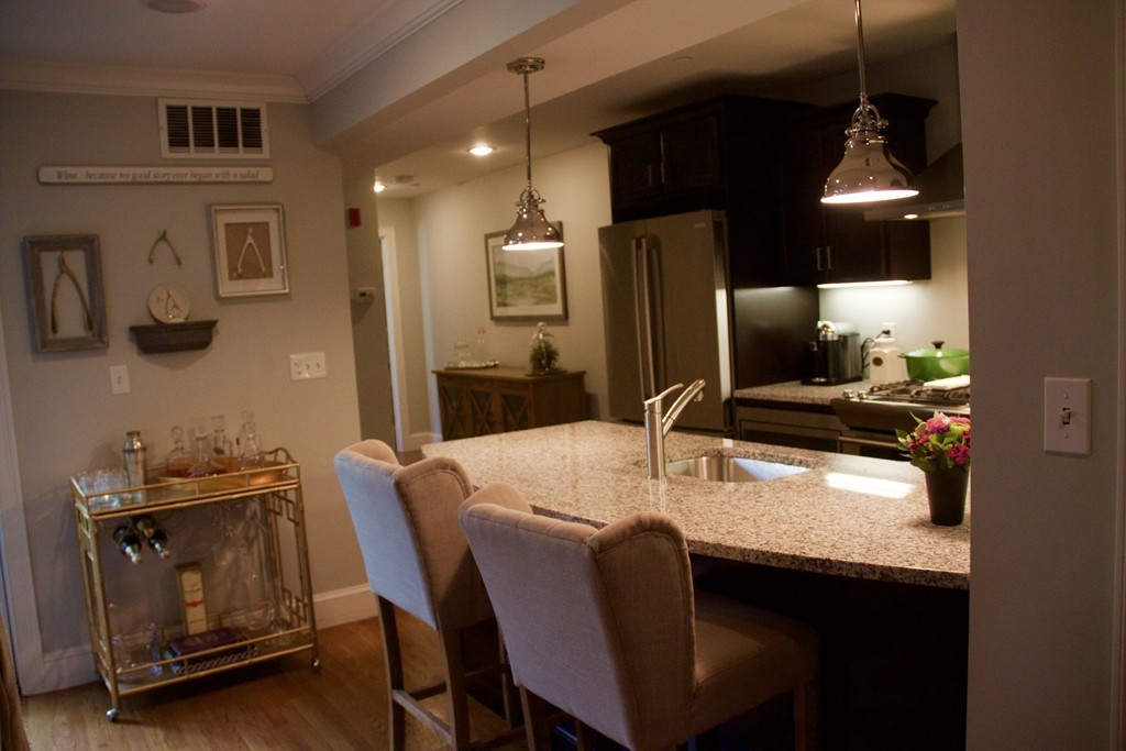 47 Soley Street, Unit 2 Boston, MA 02129 - Photo 6 of 23 a kitchen with a table chairs and refrigerator