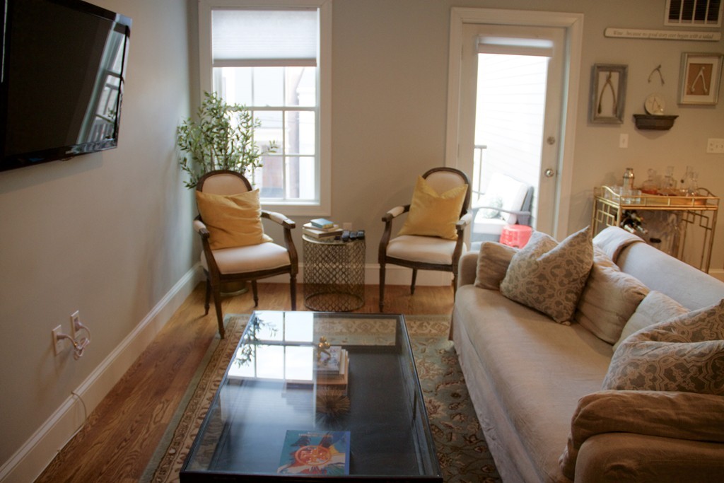 47 Soley Street, Unit 2 Boston, MA 02129 - Photo 8 of 23 a living room with furniture fireplace and flat screen tv