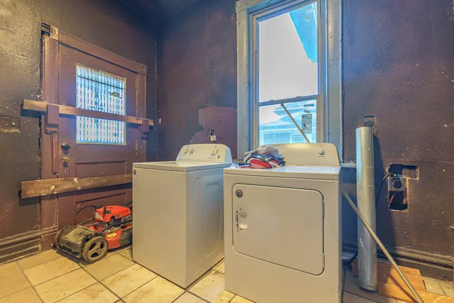 a utility room with dryer and washer