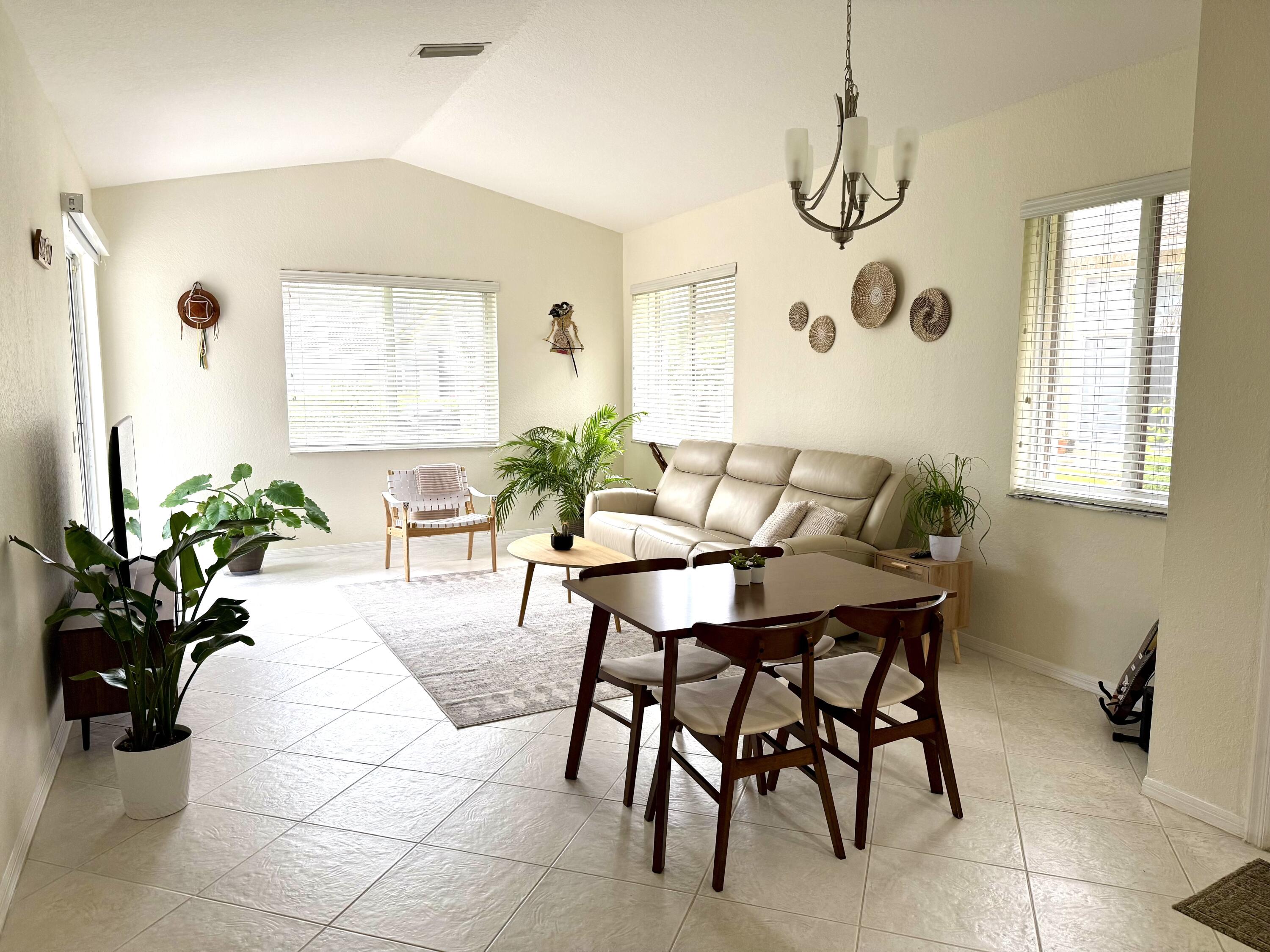15864 Southwest 10th Street Pembroke Pines, FL 33027 - Photo 5 of 11 a dining room with furniture and window
