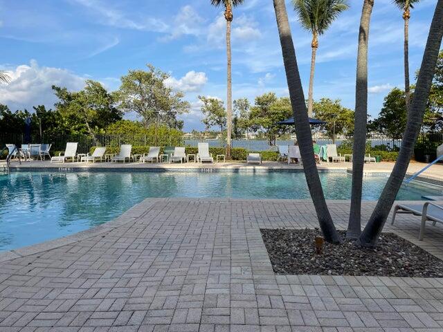 1200 Scotia Drive, Unit 305 Hypoluxo, FL 33462 - Photo 16 of 28 a view of a lake