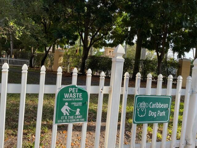 1200 Scotia Drive, Unit 305 Hypoluxo, FL 33462 - Photo 26 of 28 a view of building