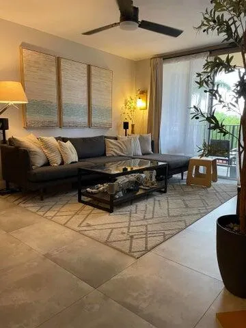 a bedroom with a bed and dresser