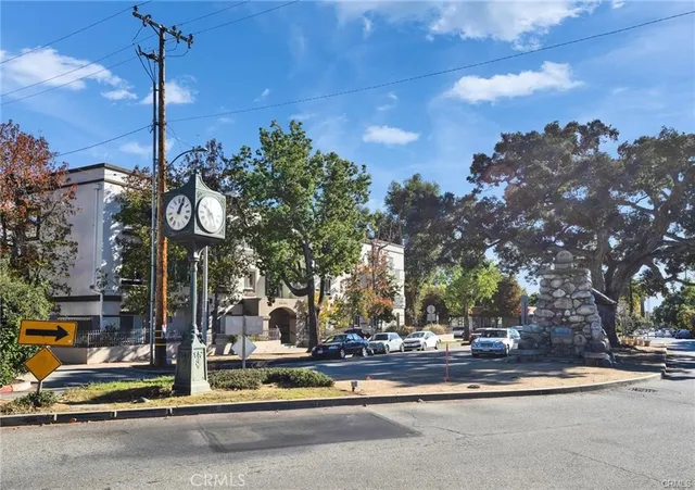 a view of a street with brick building in front of it