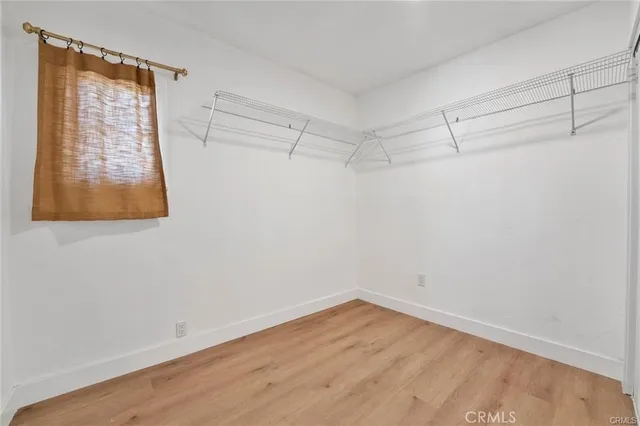 a view of a room that has a window in it