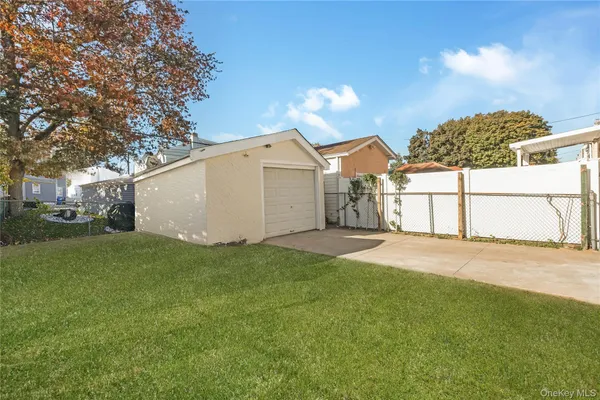 a view of a backyard of the house