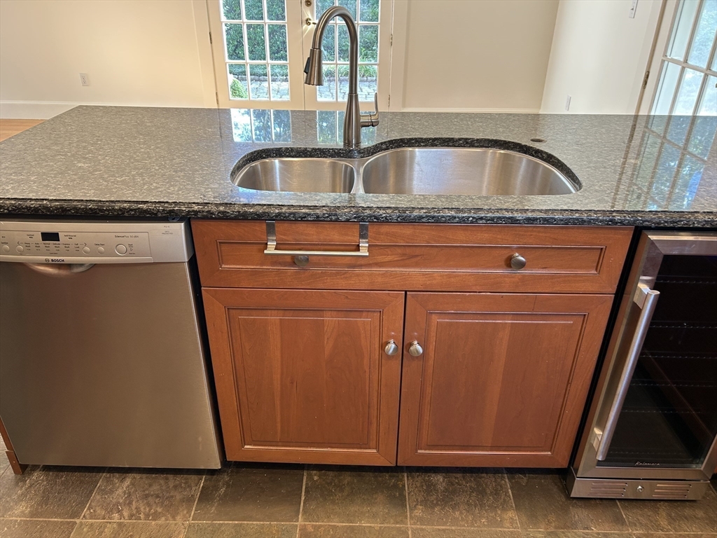 99 Tower Road Lincoln, MA 01773 - Photo 18 of 42 a close view of sink gate with granite countertop
