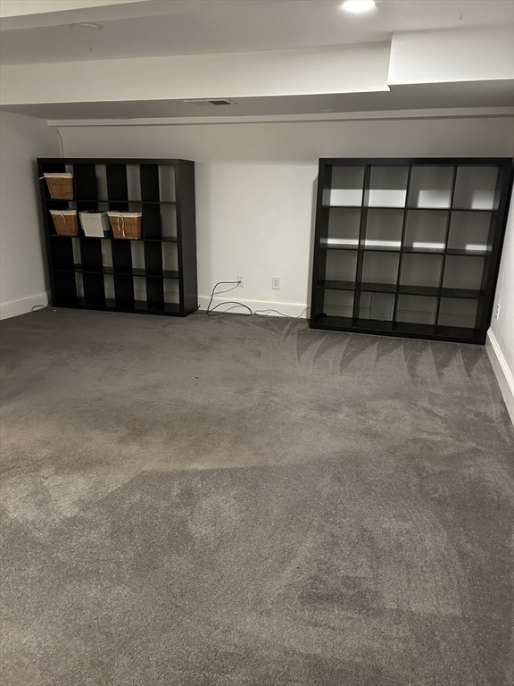 99 Tower Road Lincoln, MA 01773 - Photo 34 of 42 a view of an empty room with closet and garage