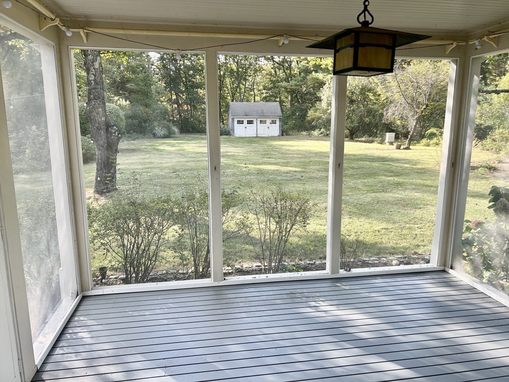 99 Tower Road Lincoln, MA 01773 - Photo 35 of 42 a view of a room with wooden floor and windows