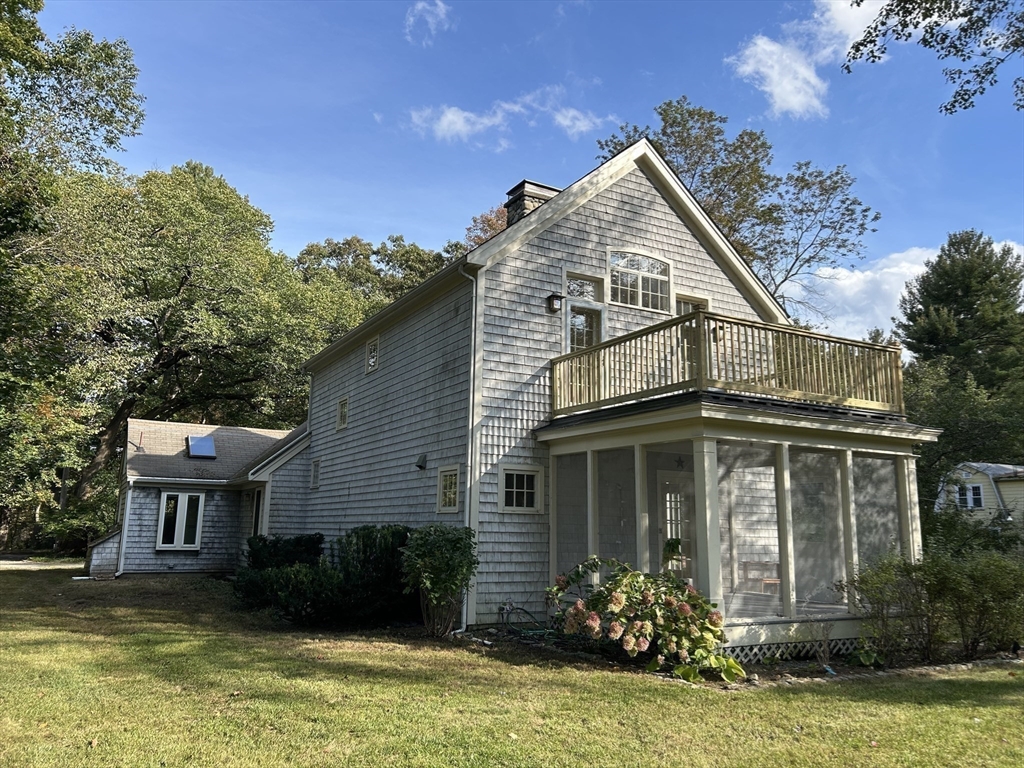 99 Tower Road Lincoln, MA 01773 - Photo 42 of 42 a view of a house with a yard