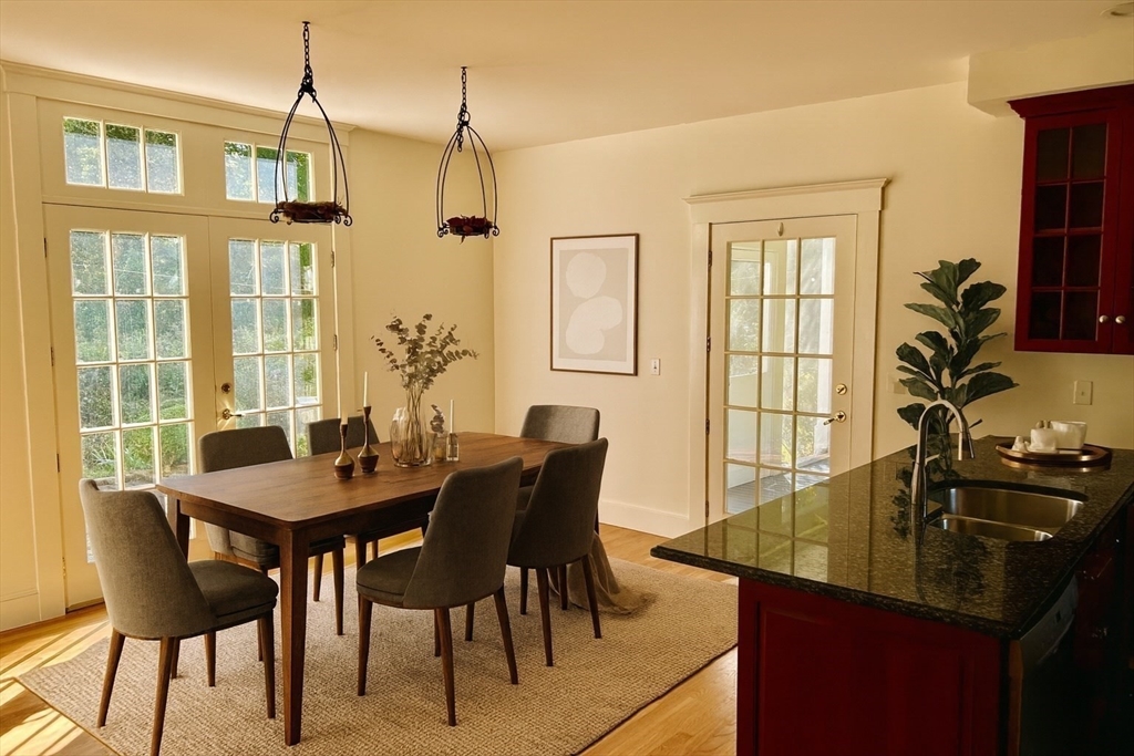 99 Tower Road Lincoln, MA 01773 - Photo 5 of 42 a dining room with furniture and window