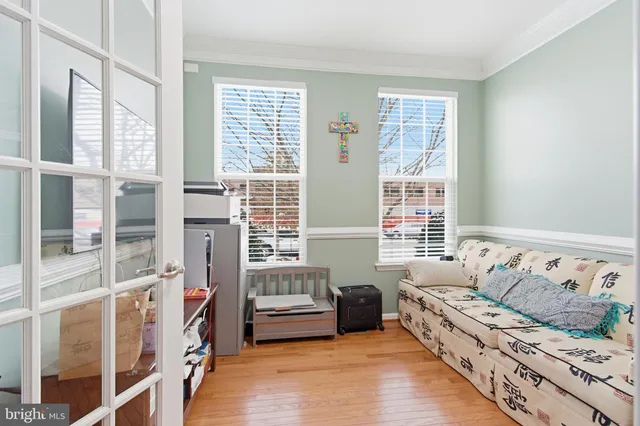 a bedroom that has a bed and a table in it