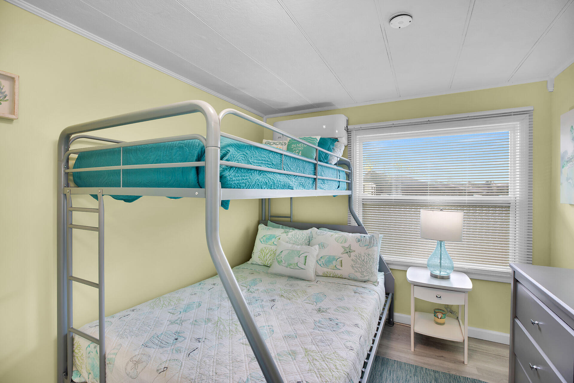 779 26th Street Ocean Marathon, FL 33050 - Photo 16 of 42 a bed room with a bed and a table