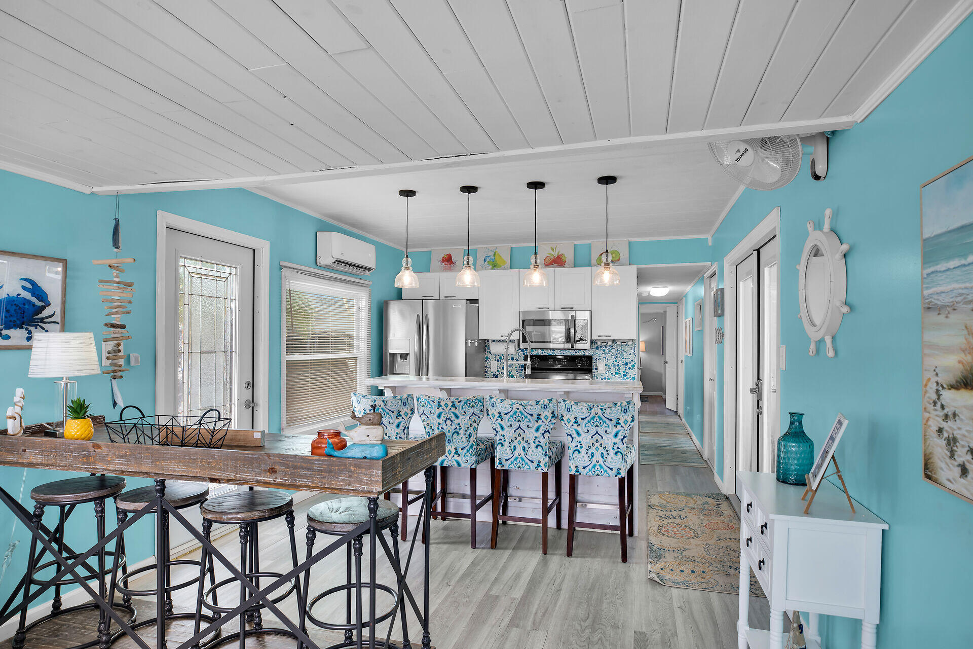 779 26th Street Ocean Marathon, FL 33050 - Photo 7 of 42 a view of a dining room with furniture window and wooden floor