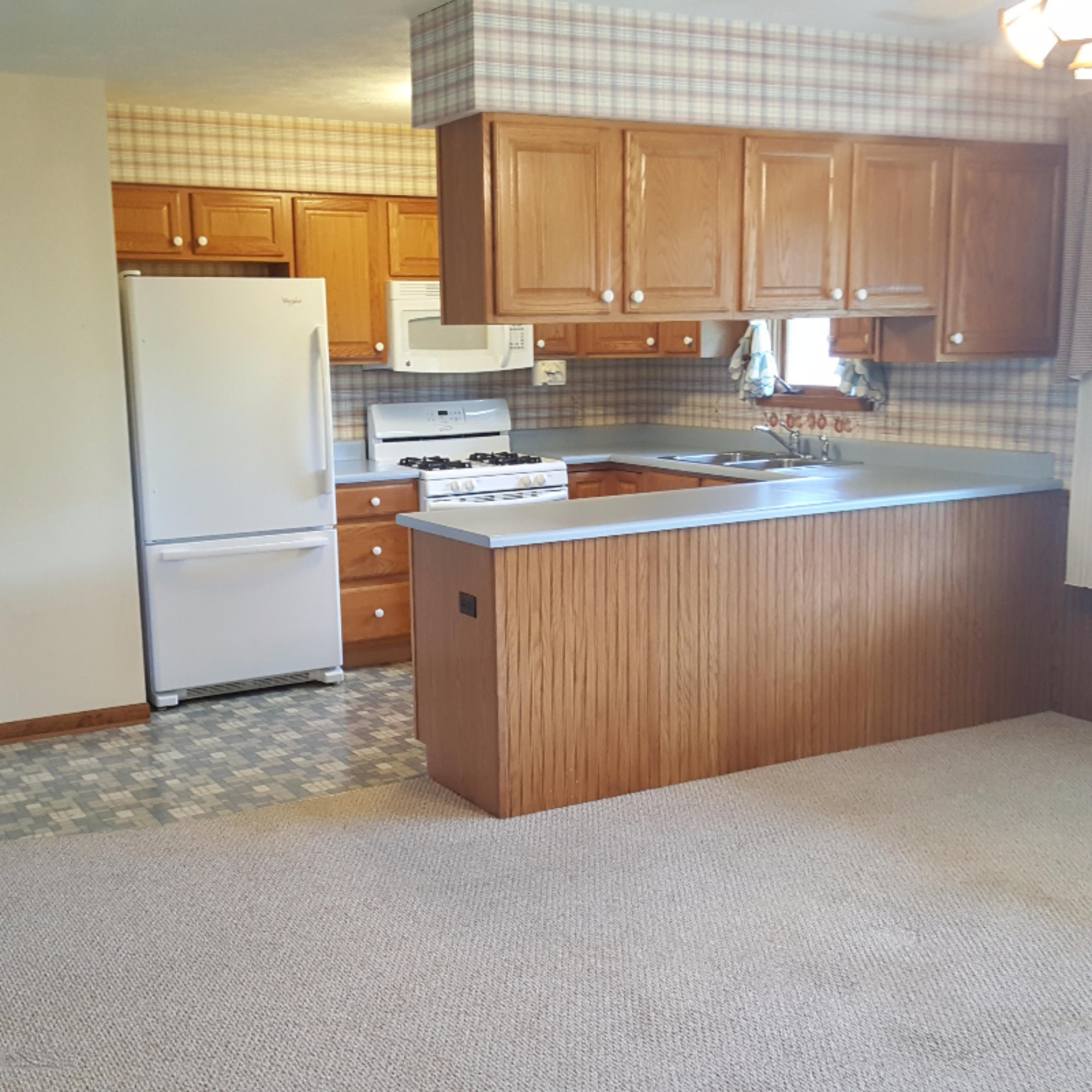 12200 South Sprinkle Road Vicksburg, MI 49097 - Photo 14 of 44 Plenty of cabinets and a pantry