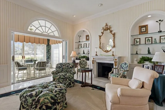 a dining room with furniture and window