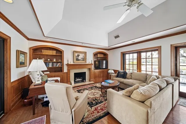 a house view with swimming pool and outdoor seating