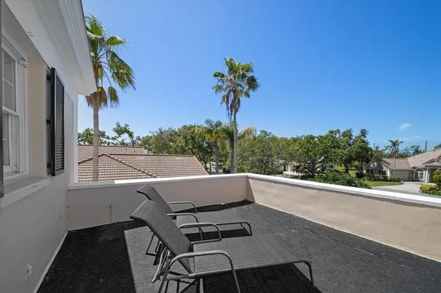 a view of a lake with a house in the background