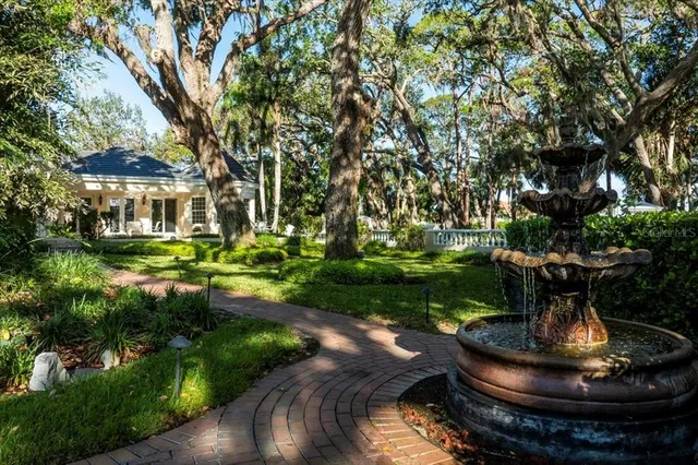 a view of a house with a swimming pool