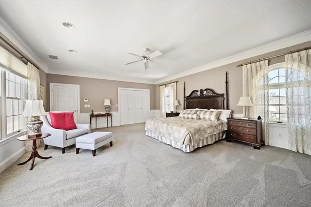 a kitchen with stainless steel appliances granite countertop a refrigerator and a stove