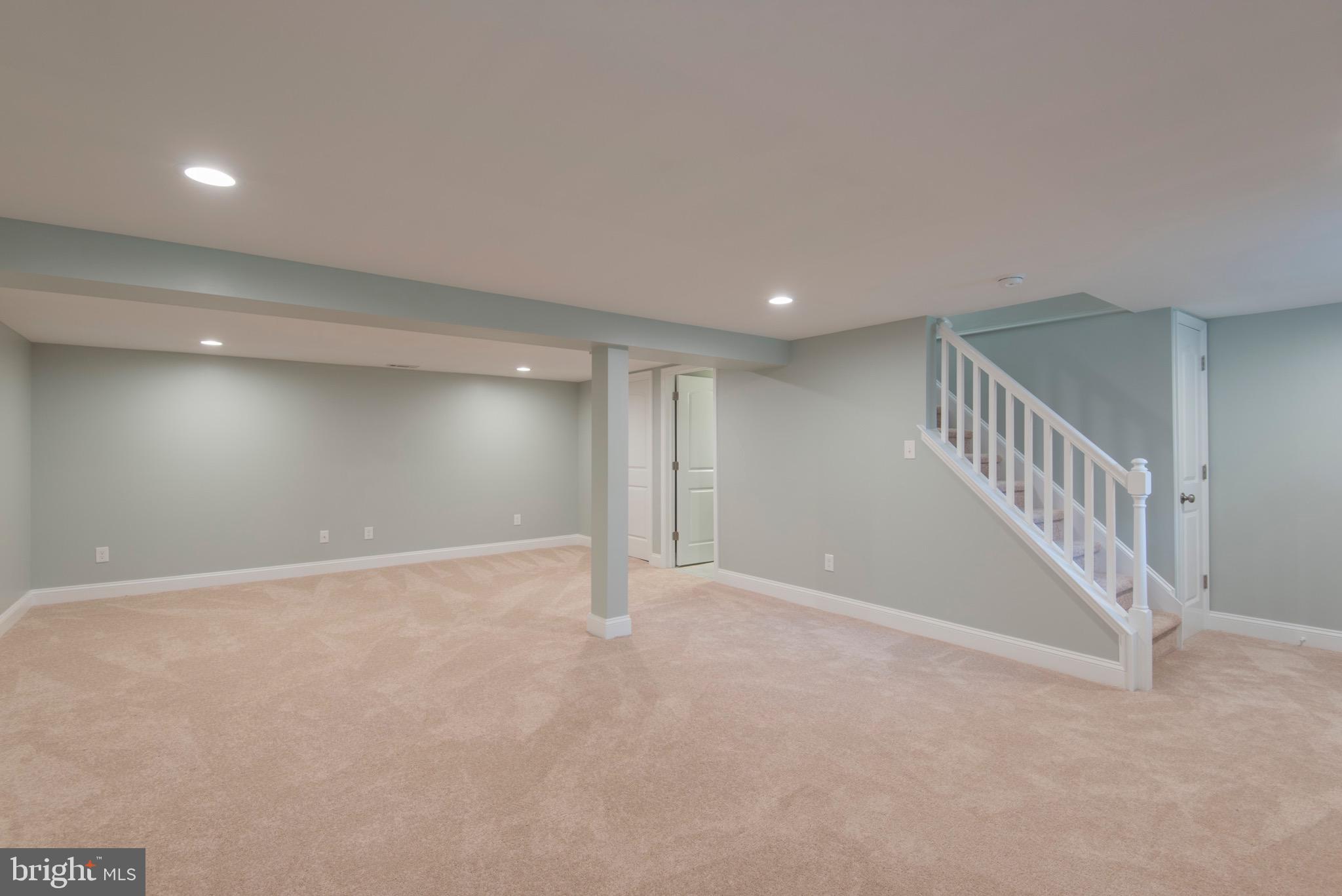 103 East Rose Valley Road Wallingford, PA 19086 - Photo 50 of 75 a view of an empty room with stairs