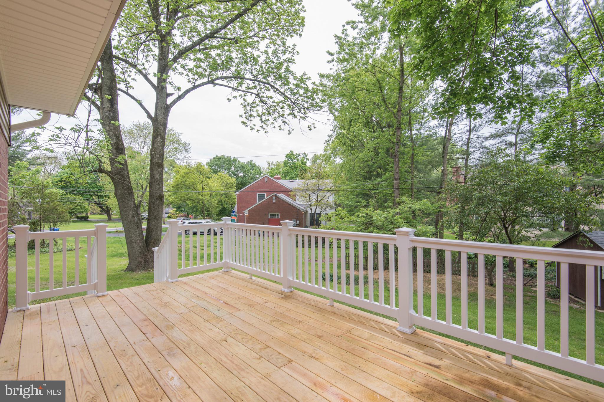 103 East Rose Valley Road Wallingford, PA 19086 - Photo 66 of 75 a view of a wooden roof deck