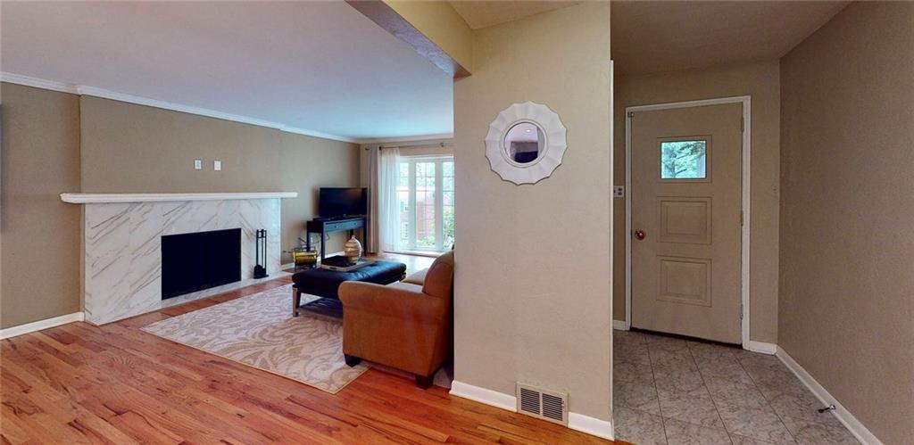 47 Holland Road Pittsburgh, PA 15235 - Photo 3 of 25 Foyer/Entry - Tile transitions to beautiful original refinished hardwood flooring....